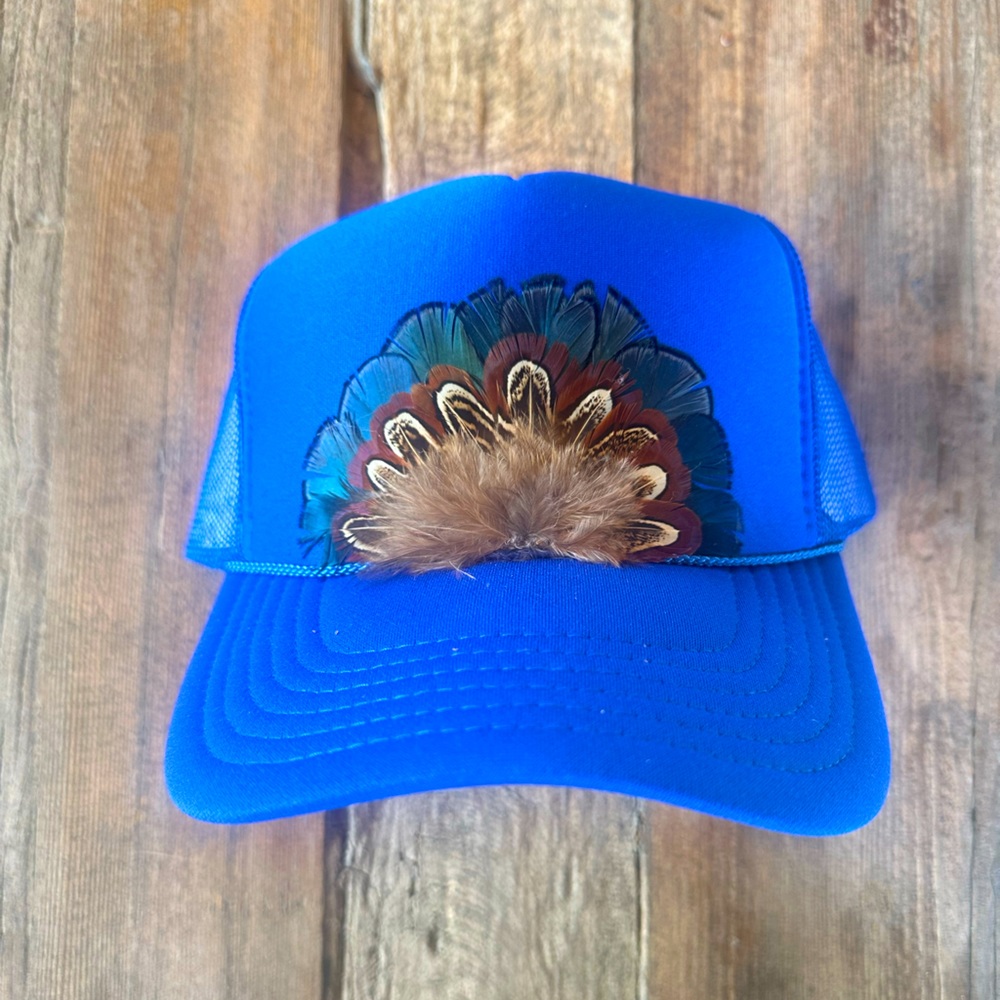 Royal blue feather trucker hat